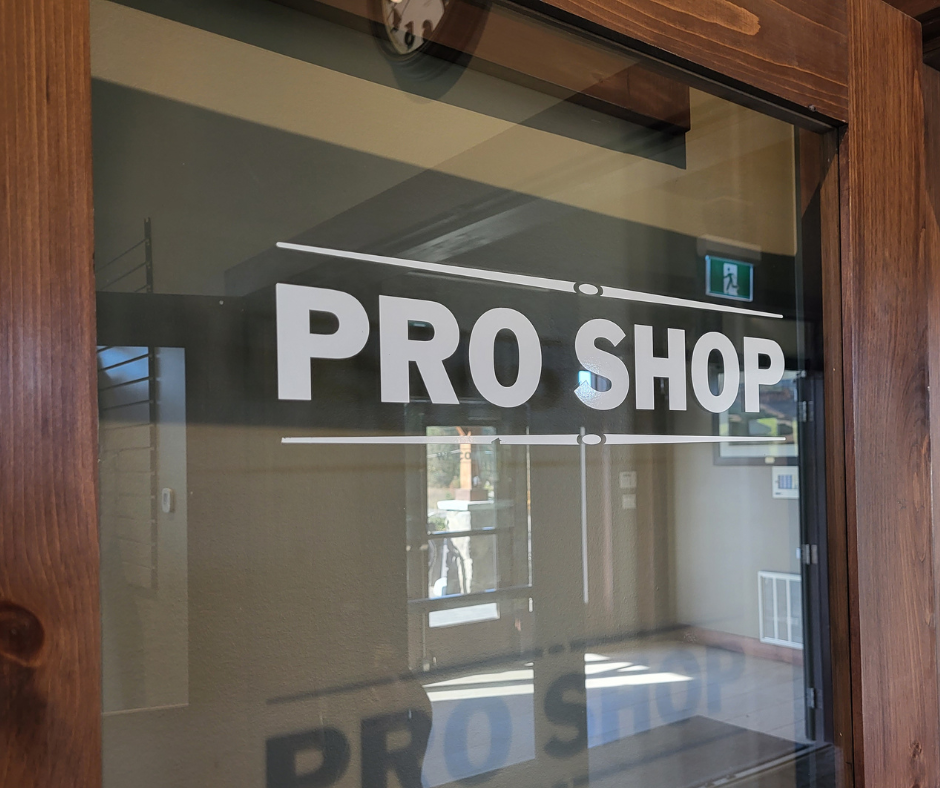 Image of the proshop entrance door window